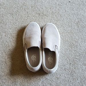 Tan Vans slip-ons